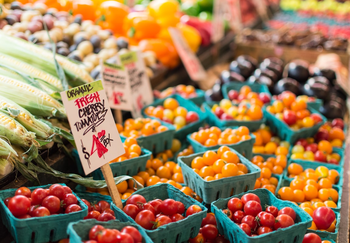 Fresh vegetables and fruits organized in a kitchen