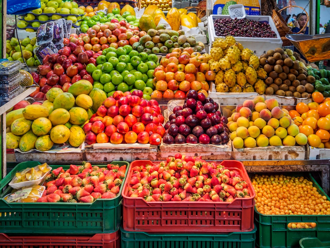Summer fruits and vegetables including berries and tomatoes